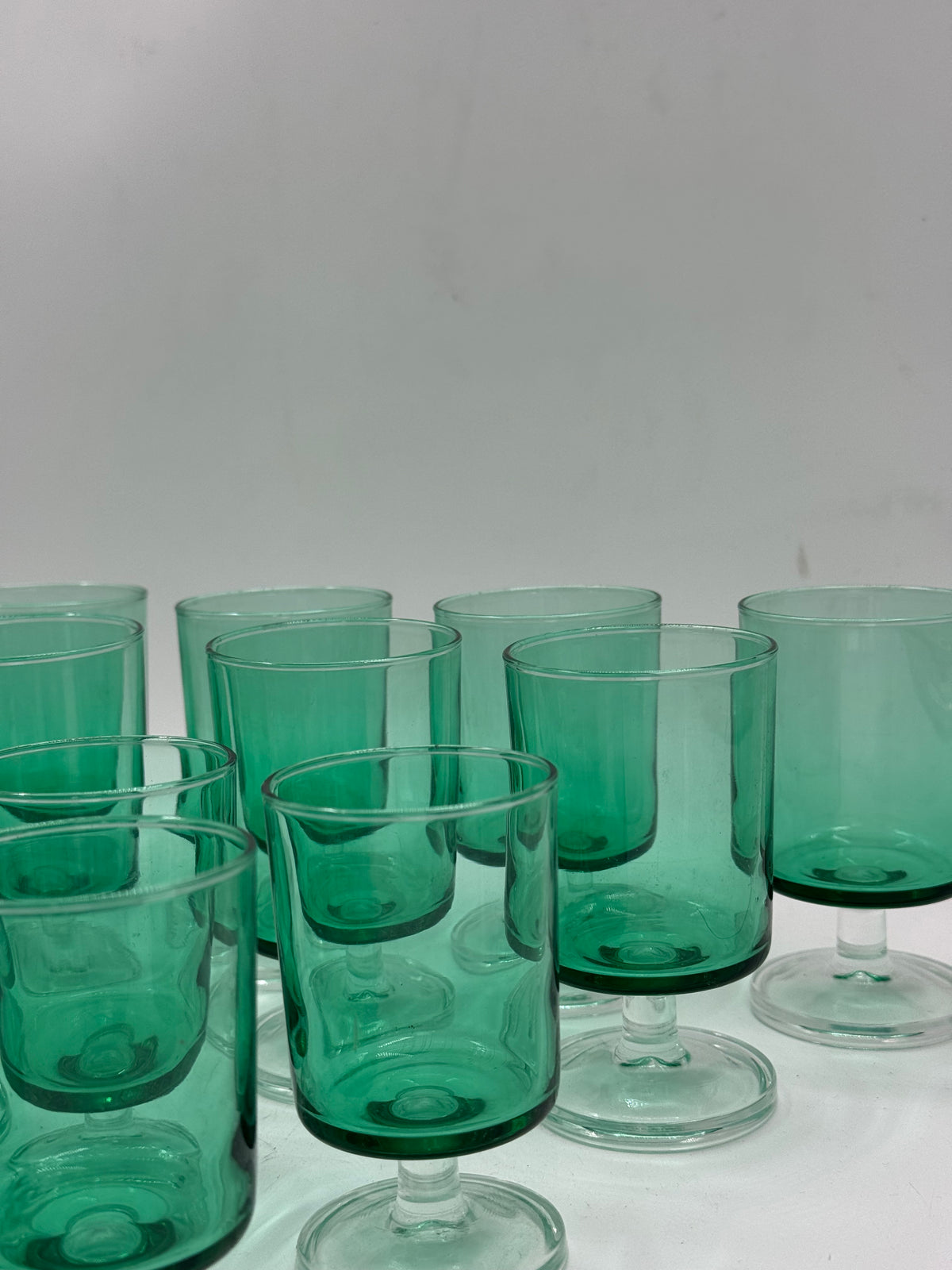 Set of 19 Vintage Green Glass Footed Tumblers, Two Sizes