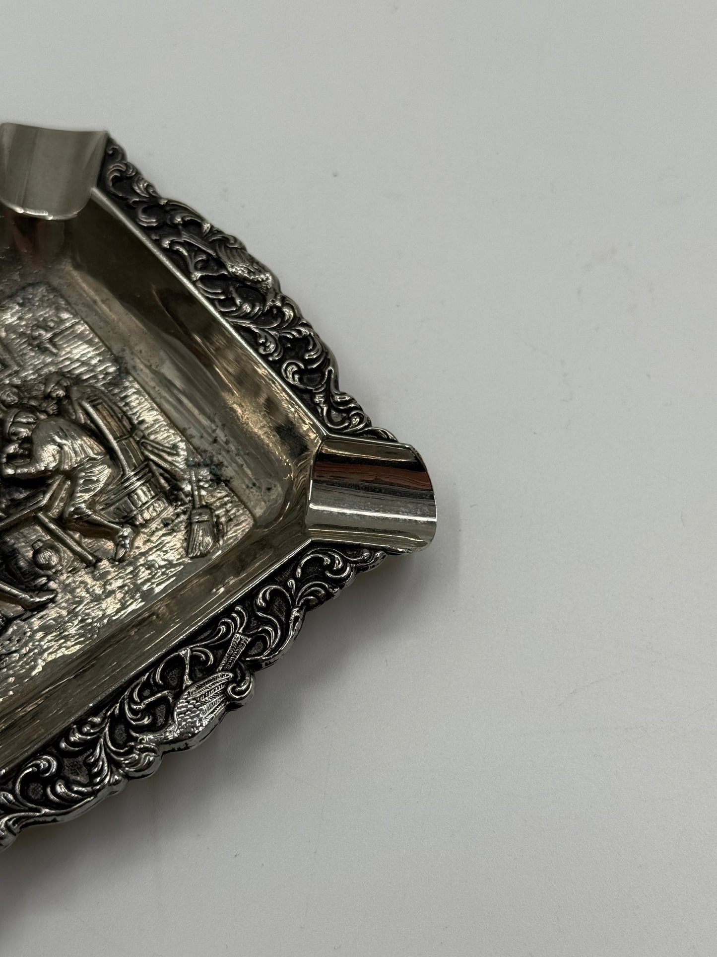 Vintage silver-plated ashtray with tavern scene relief