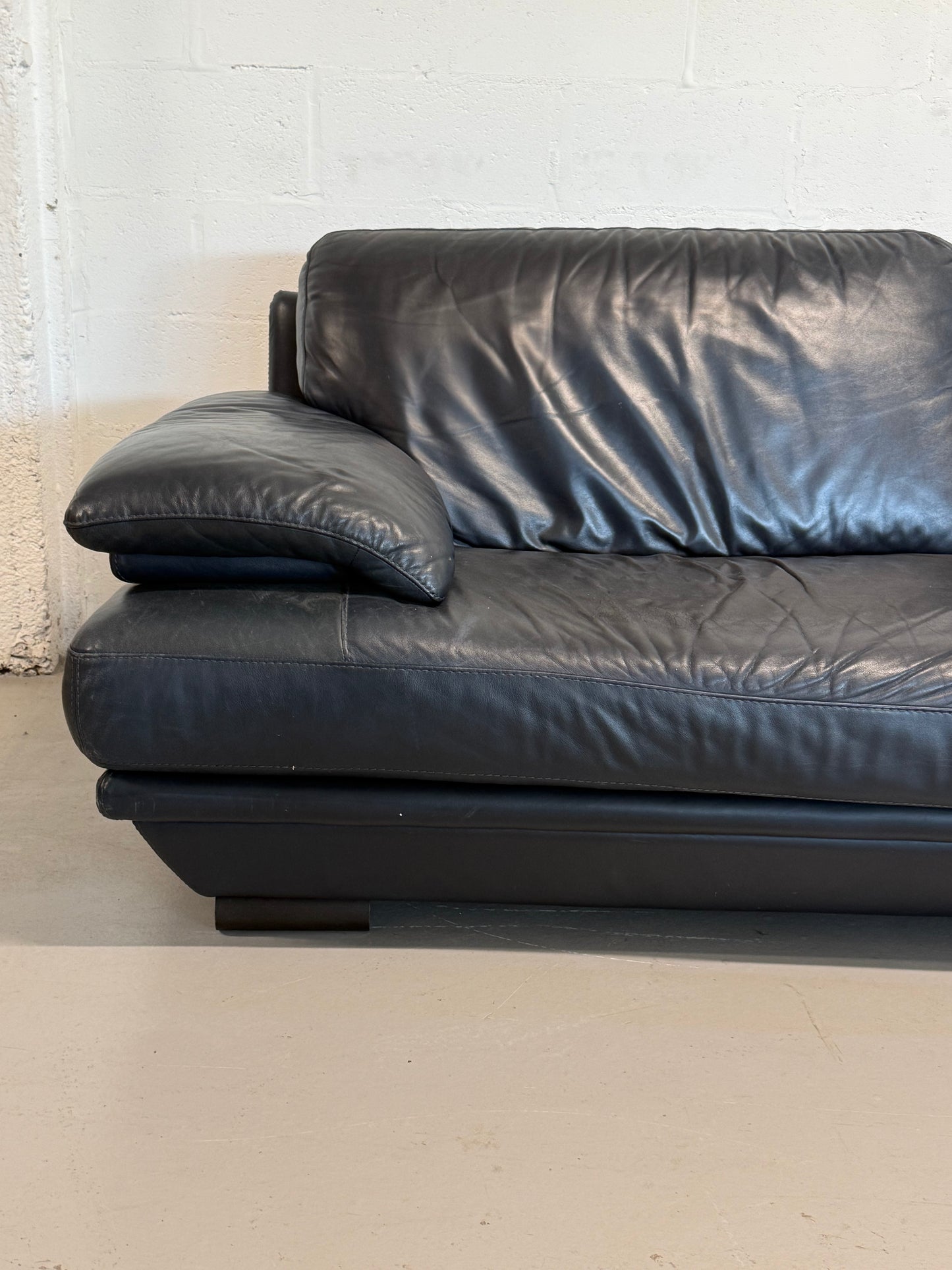 Natuzzi navy blue leather 3-seater sofa