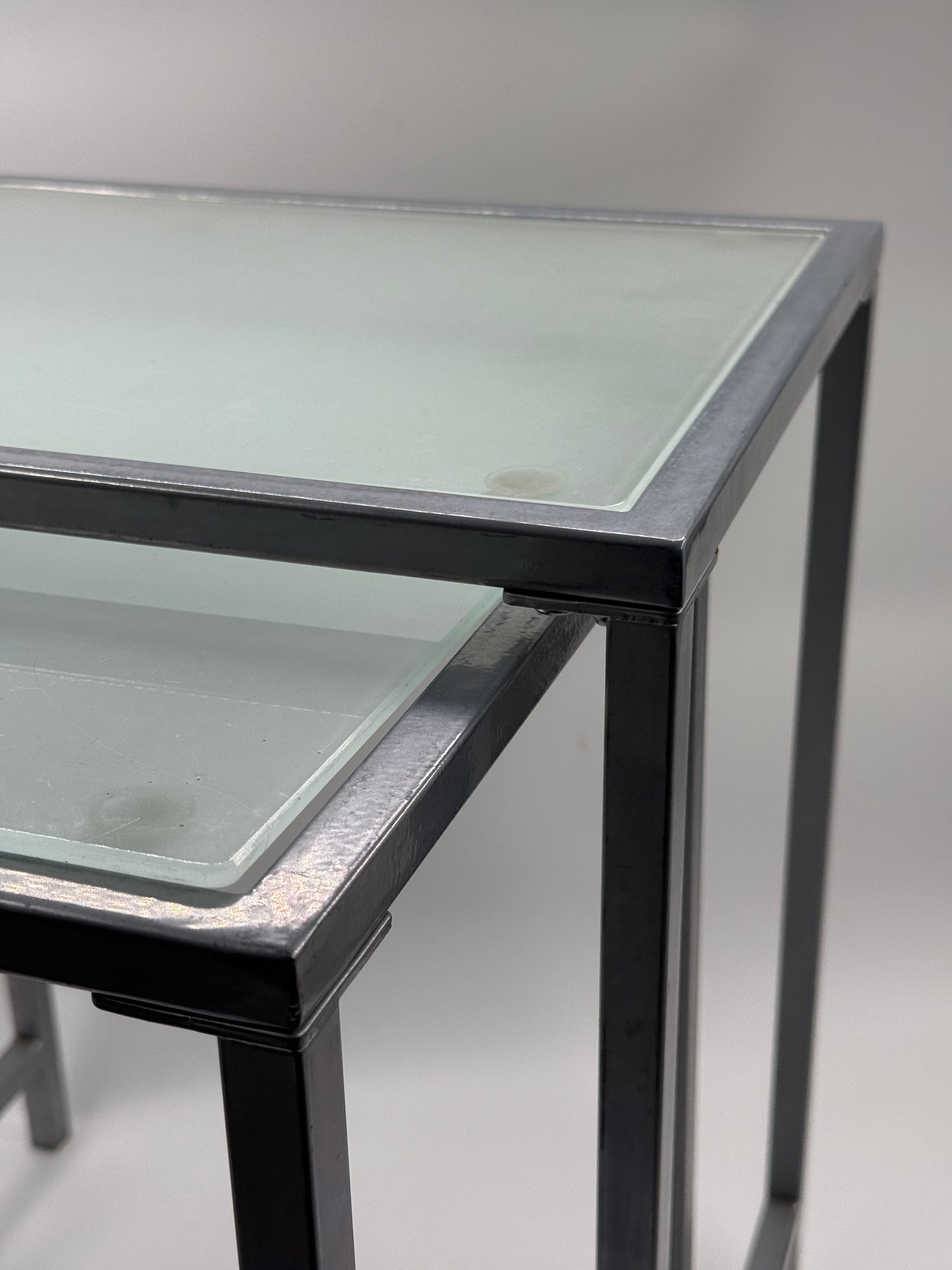 Set of Two Glass Nesting Tables (Industrial Steel Frame)