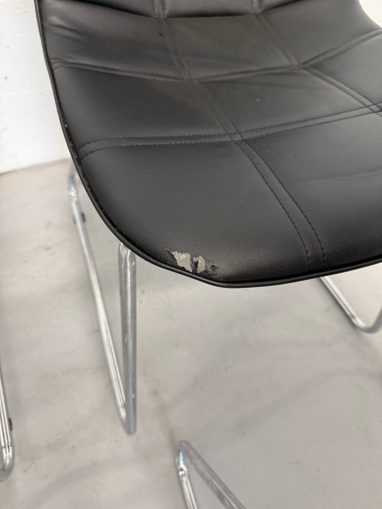 Set of 4 Black Faux Leather Dining Chairs with Chrome Sled Base