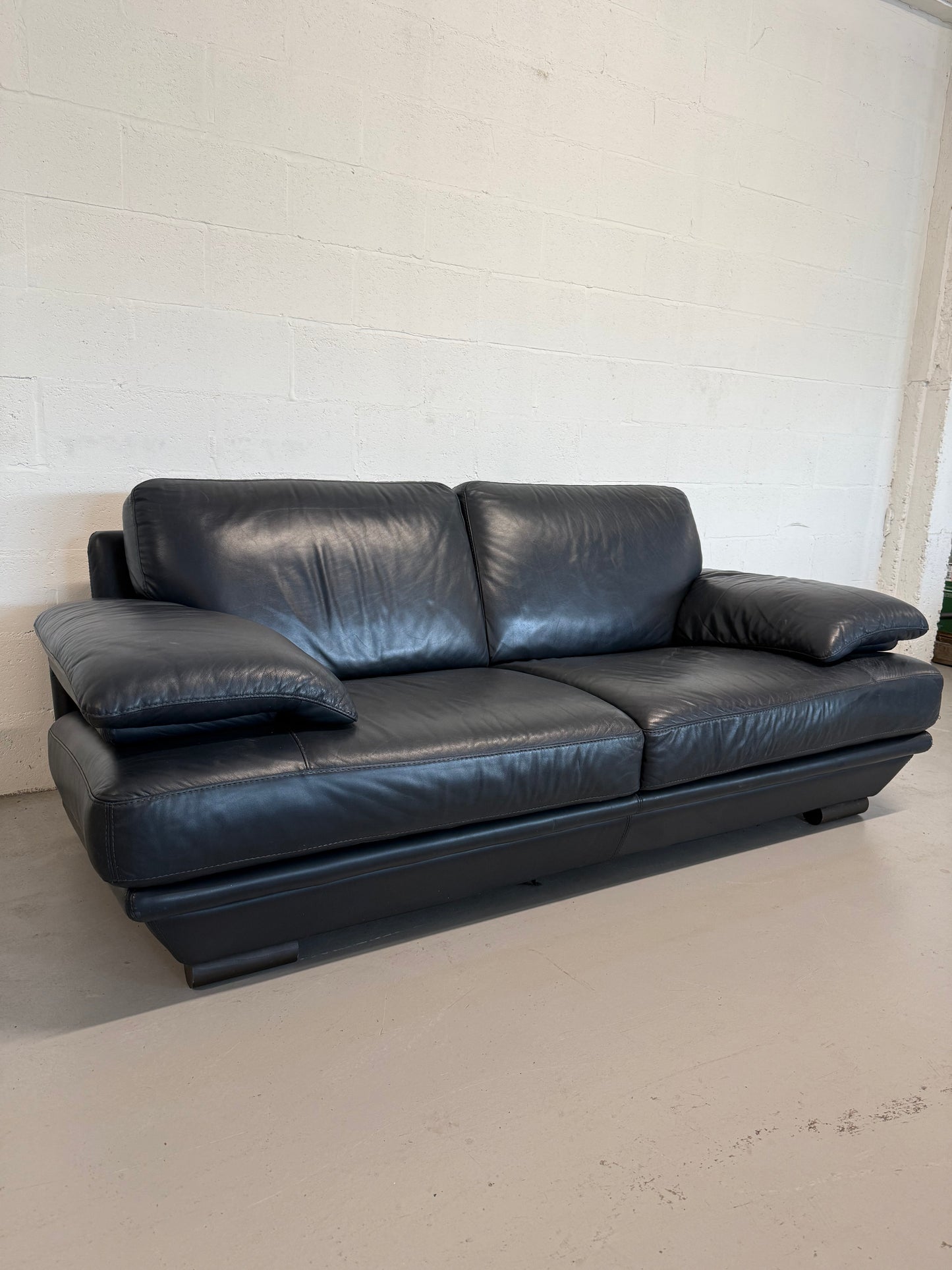 Natuzzi navy blue leather 2-seater sofa