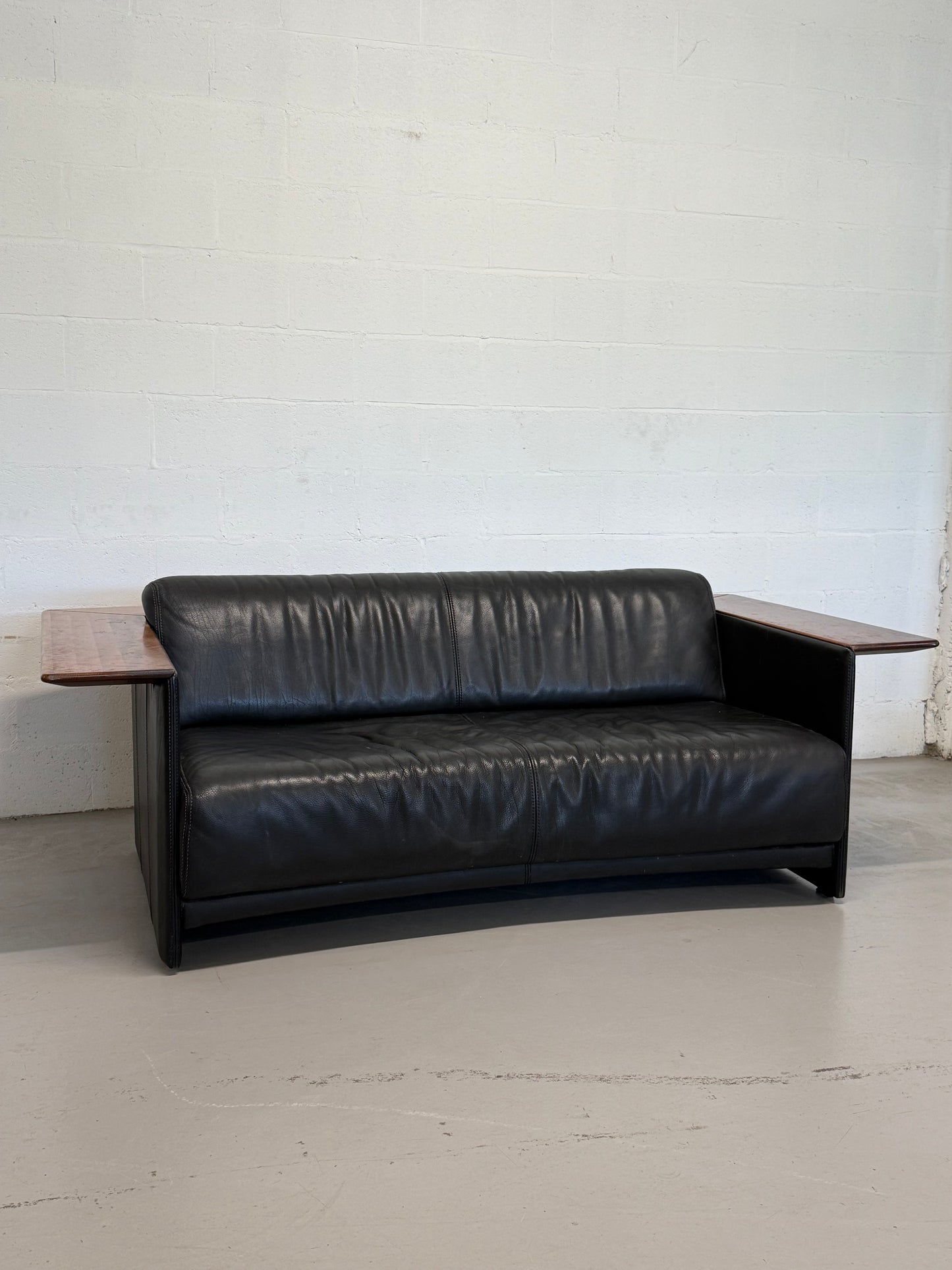Vintage Black Leather Loveseat with Cantilevered Walnut Tray Arms