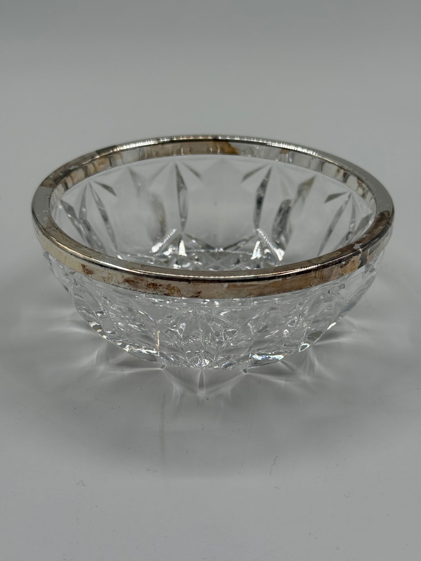 Glass bowl with metal