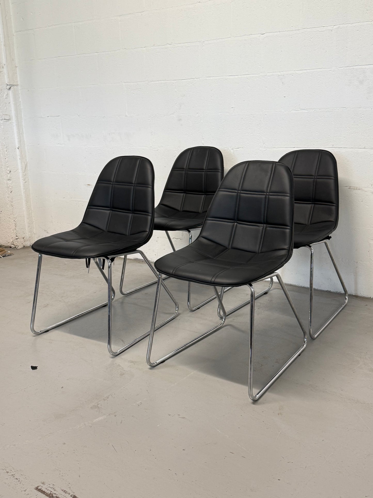 Set of 4 Black Faux Leather Dining Chairs with Chrome Sled Base