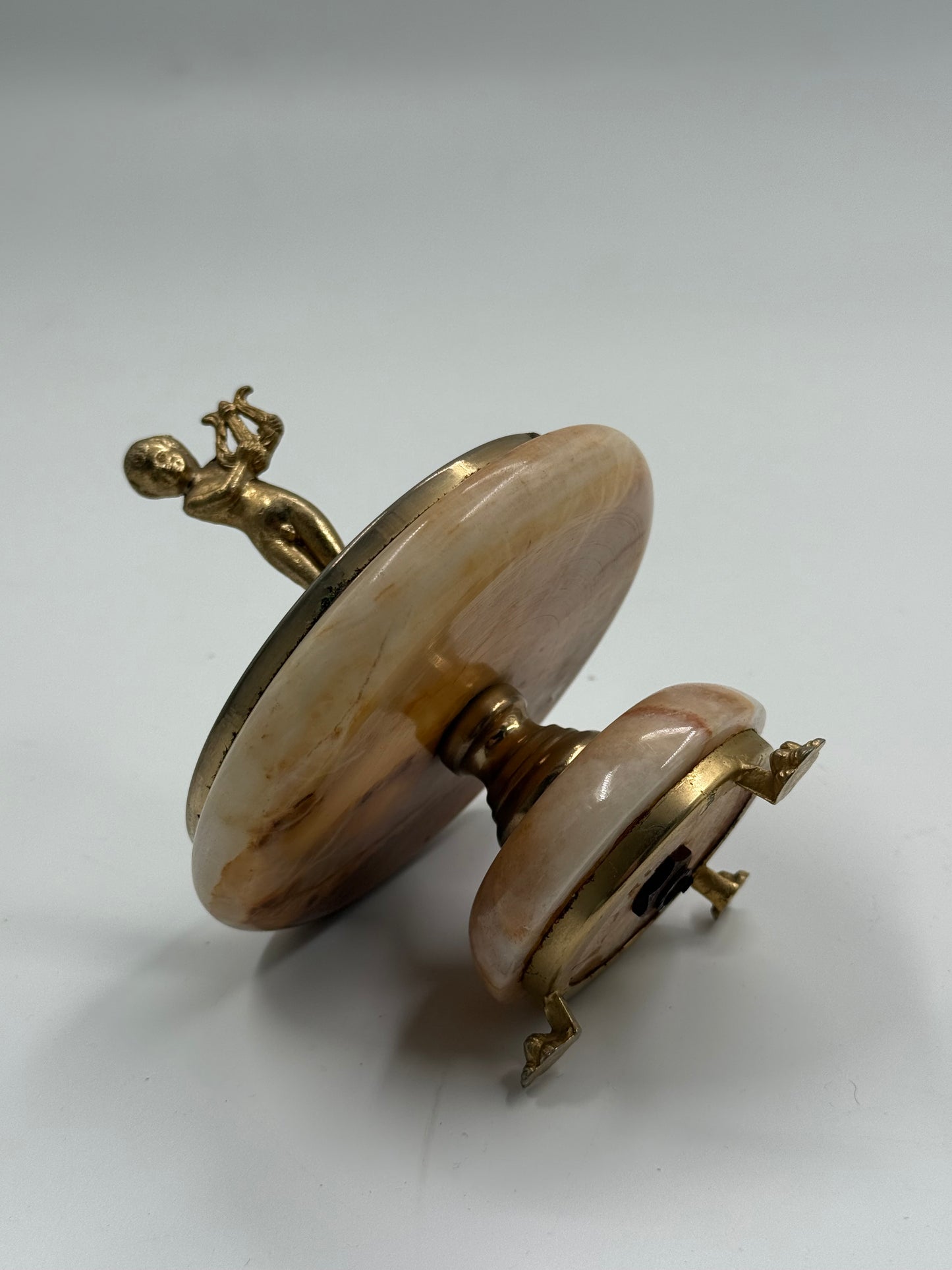 Vintage onyx ashtray with brass cherub figure