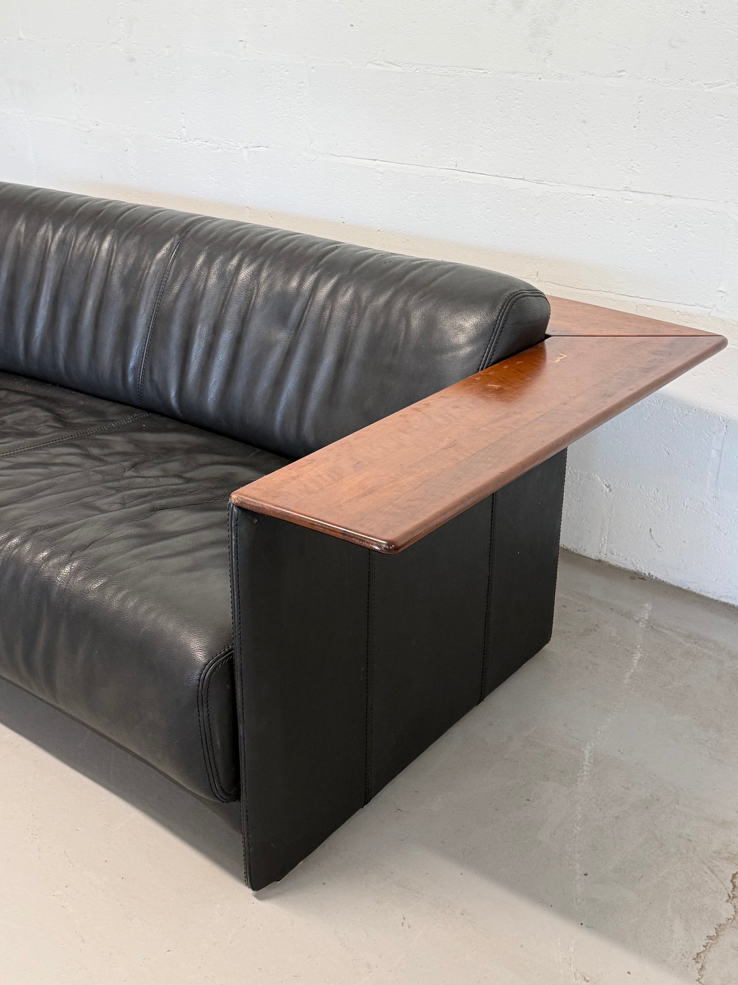 Vintage Black Leather Loveseat with Cantilevered Walnut Tray Arms