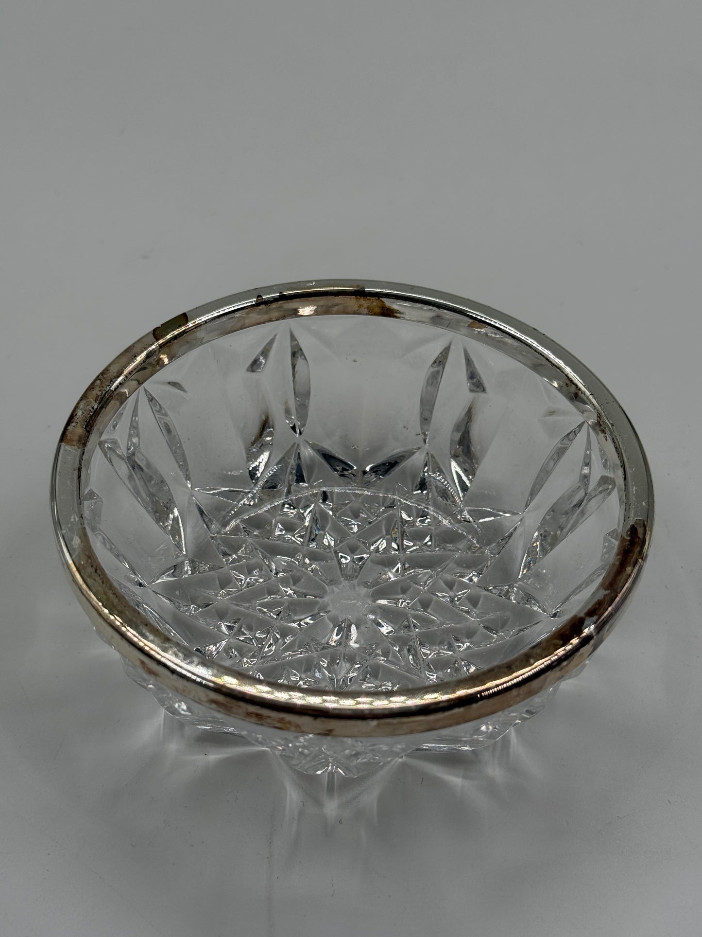 Glass bowl with metal