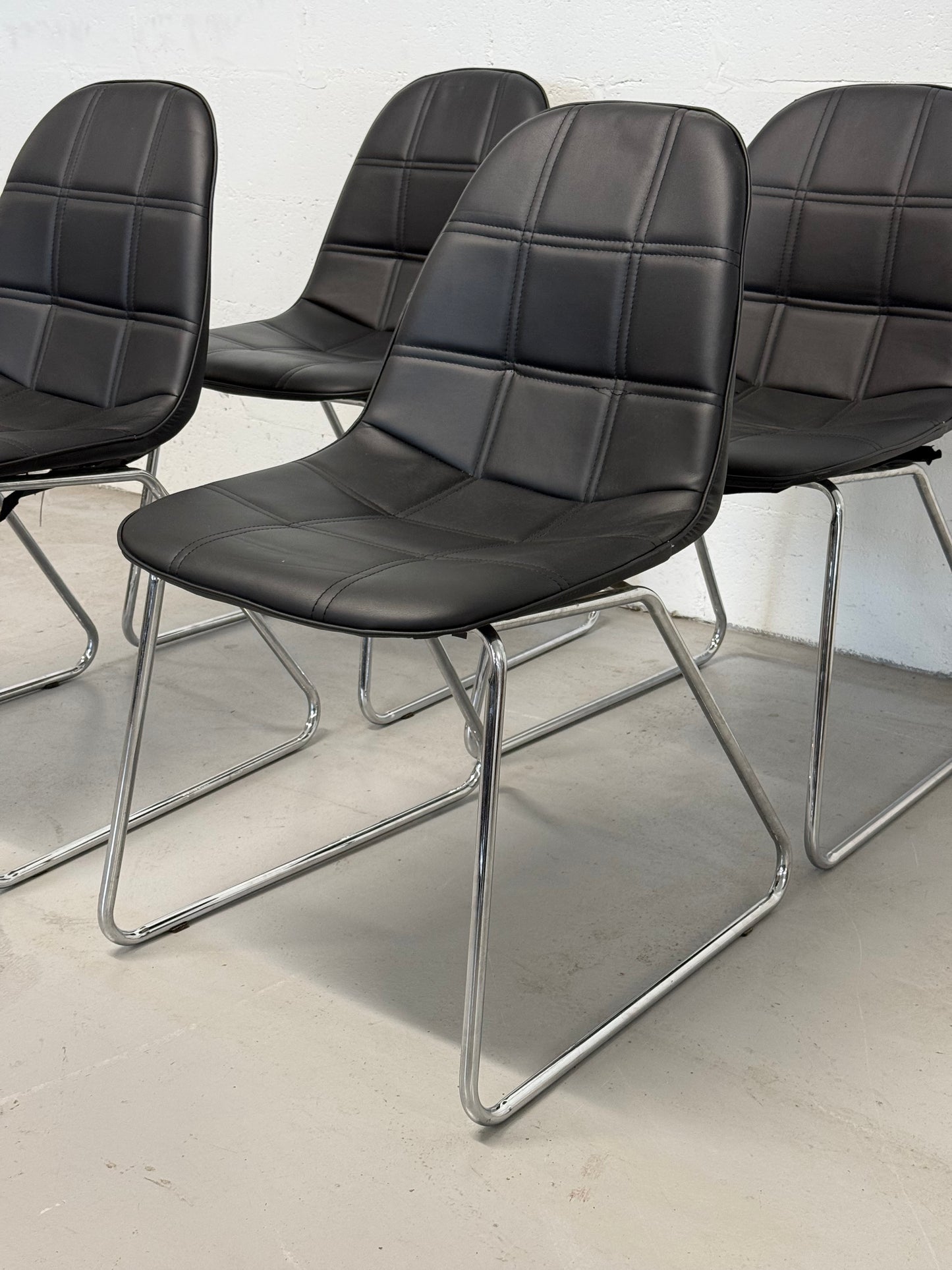 Set of 4 Black Faux Leather Dining Chairs with Chrome Sled Base