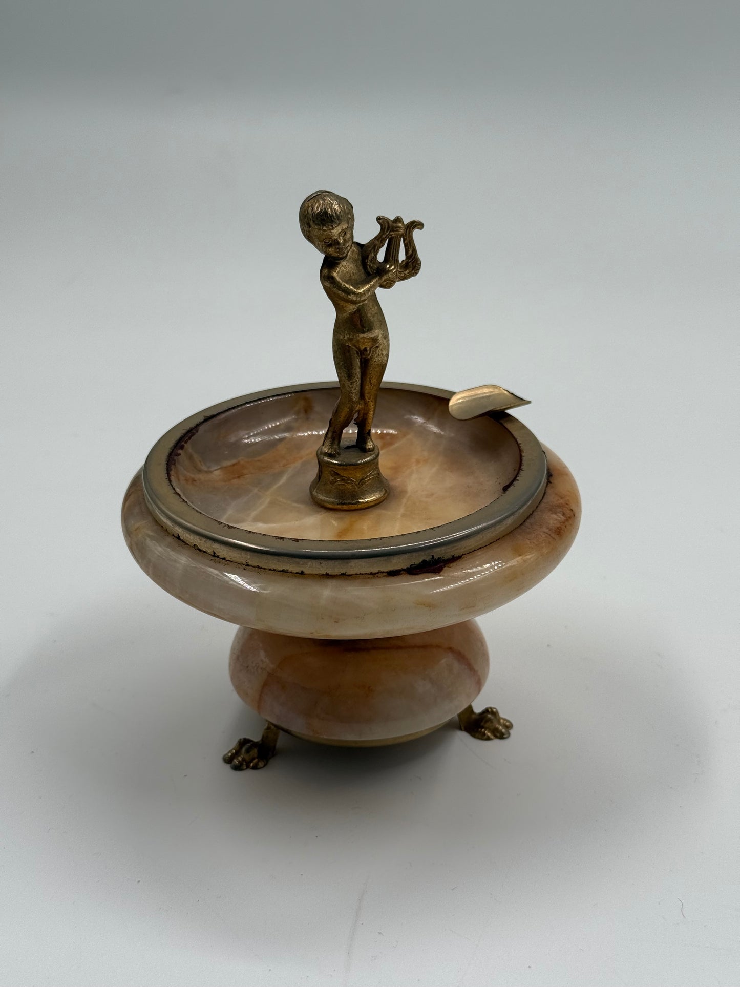 Vintage onyx ashtray with brass cherub figure