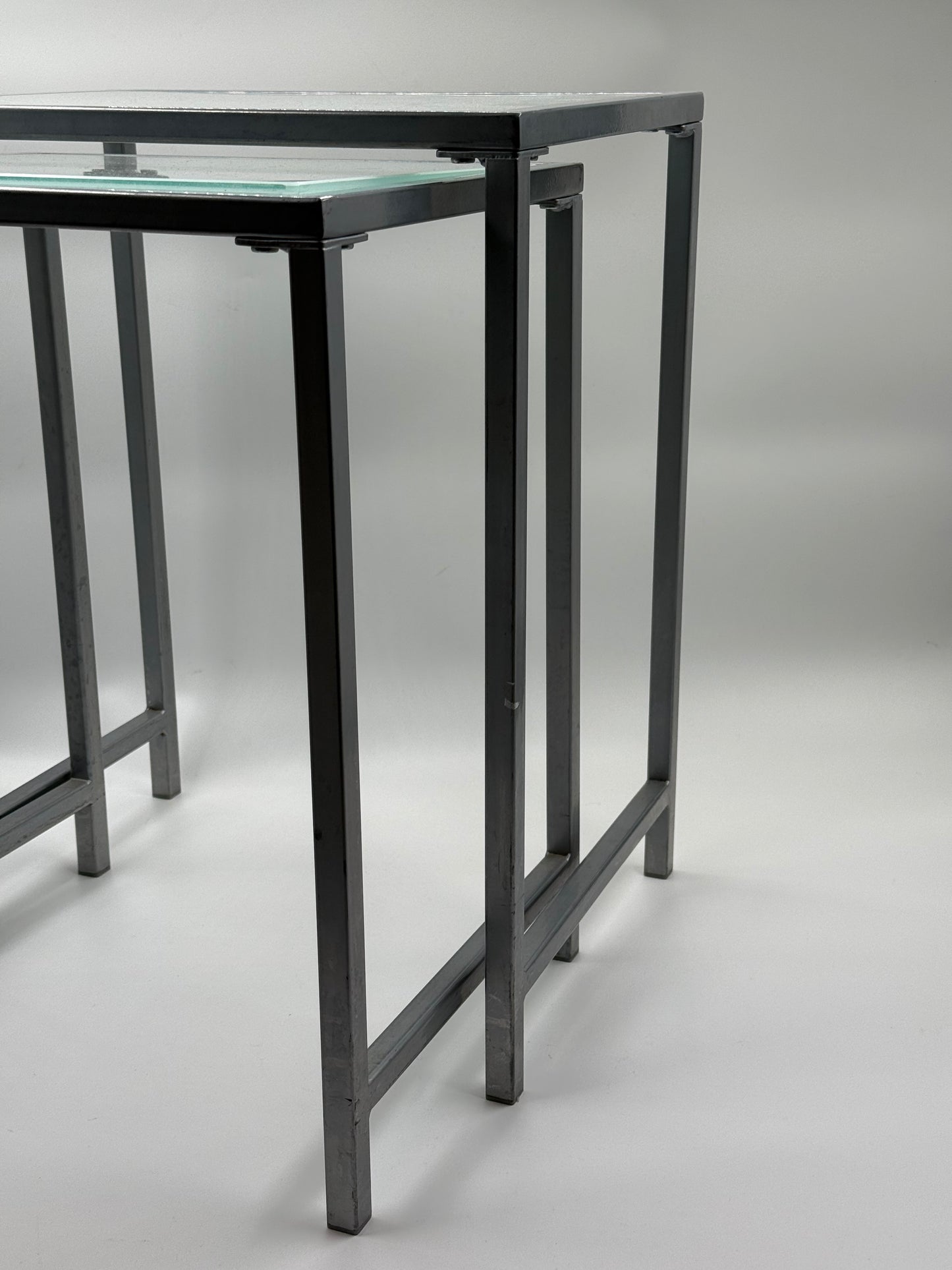Set of Two Glass Nesting Tables (Industrial Steel Frame)