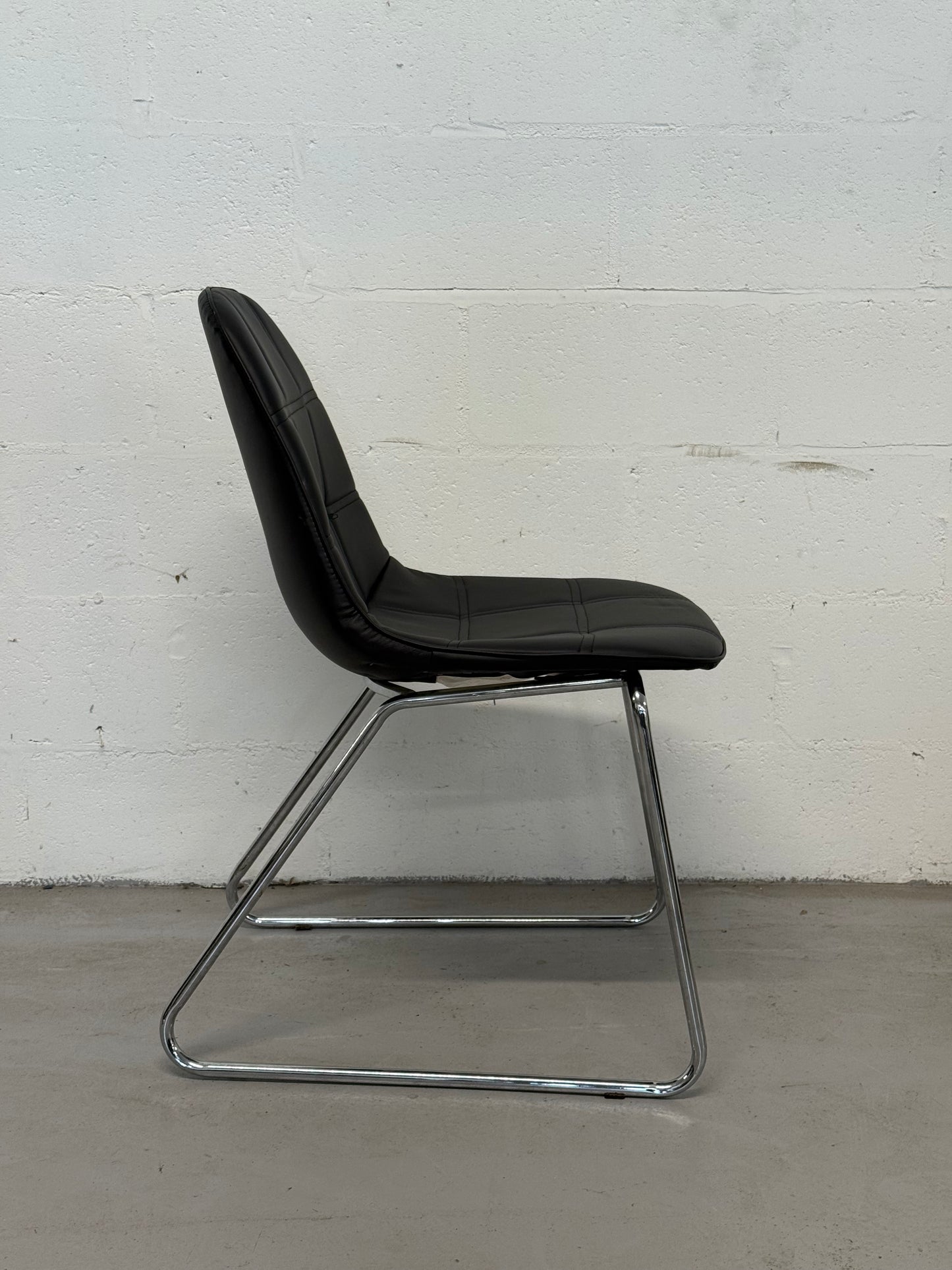 Set of 4 Black Faux Leather Dining Chairs with Chrome Sled Base