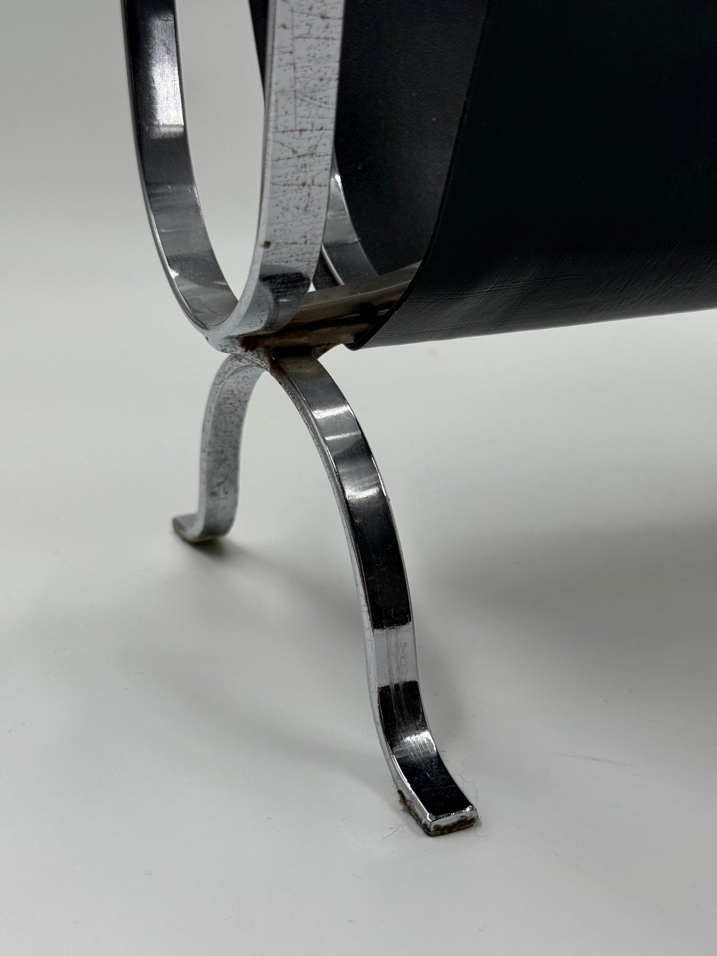 Black Leather & Chrome Magazine Rack