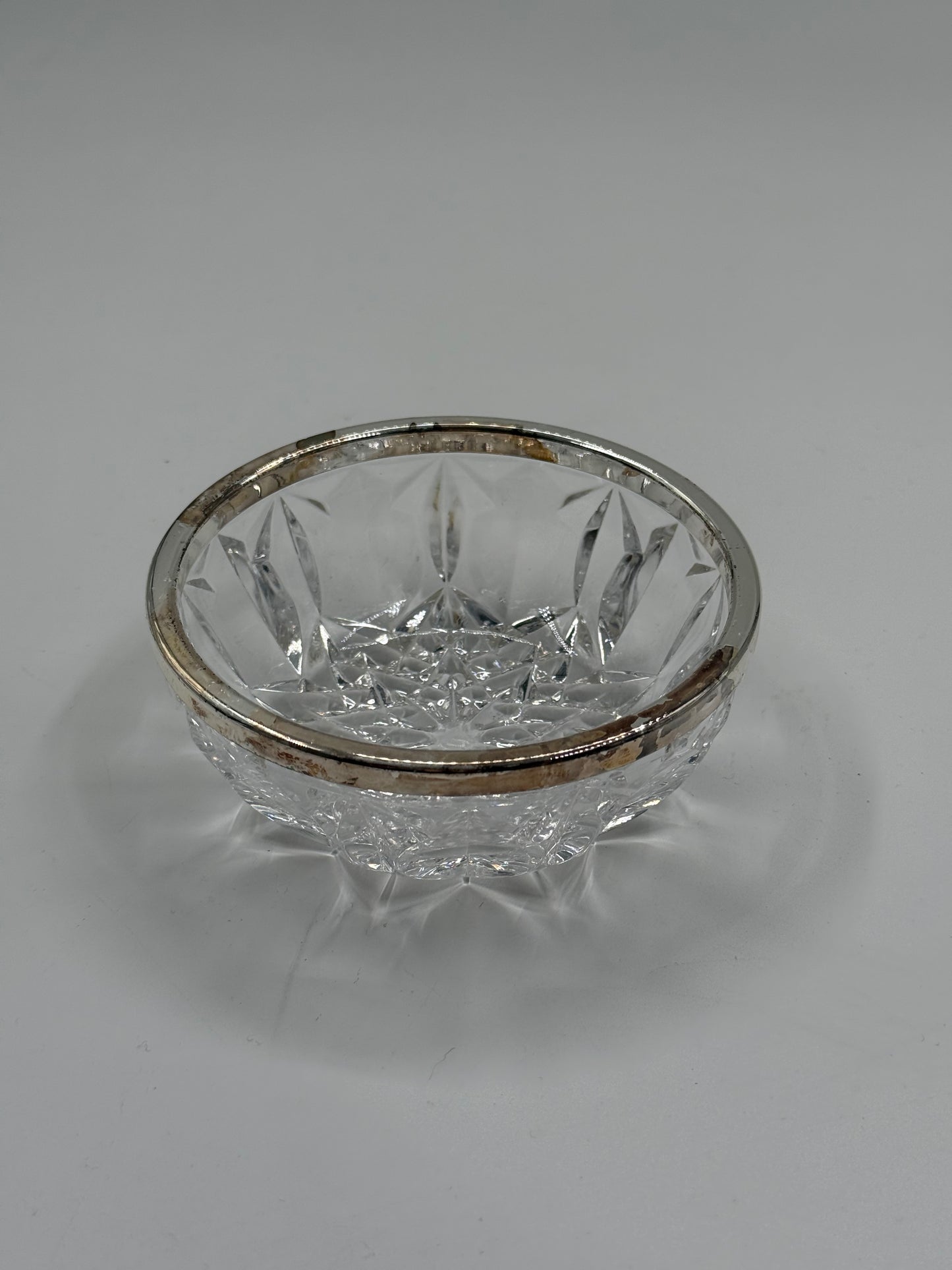 Glass bowl with metal