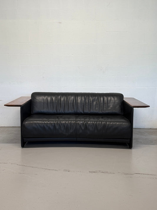 Vintage Black Leather Loveseat with Cantilevered Walnut Tray Arms
