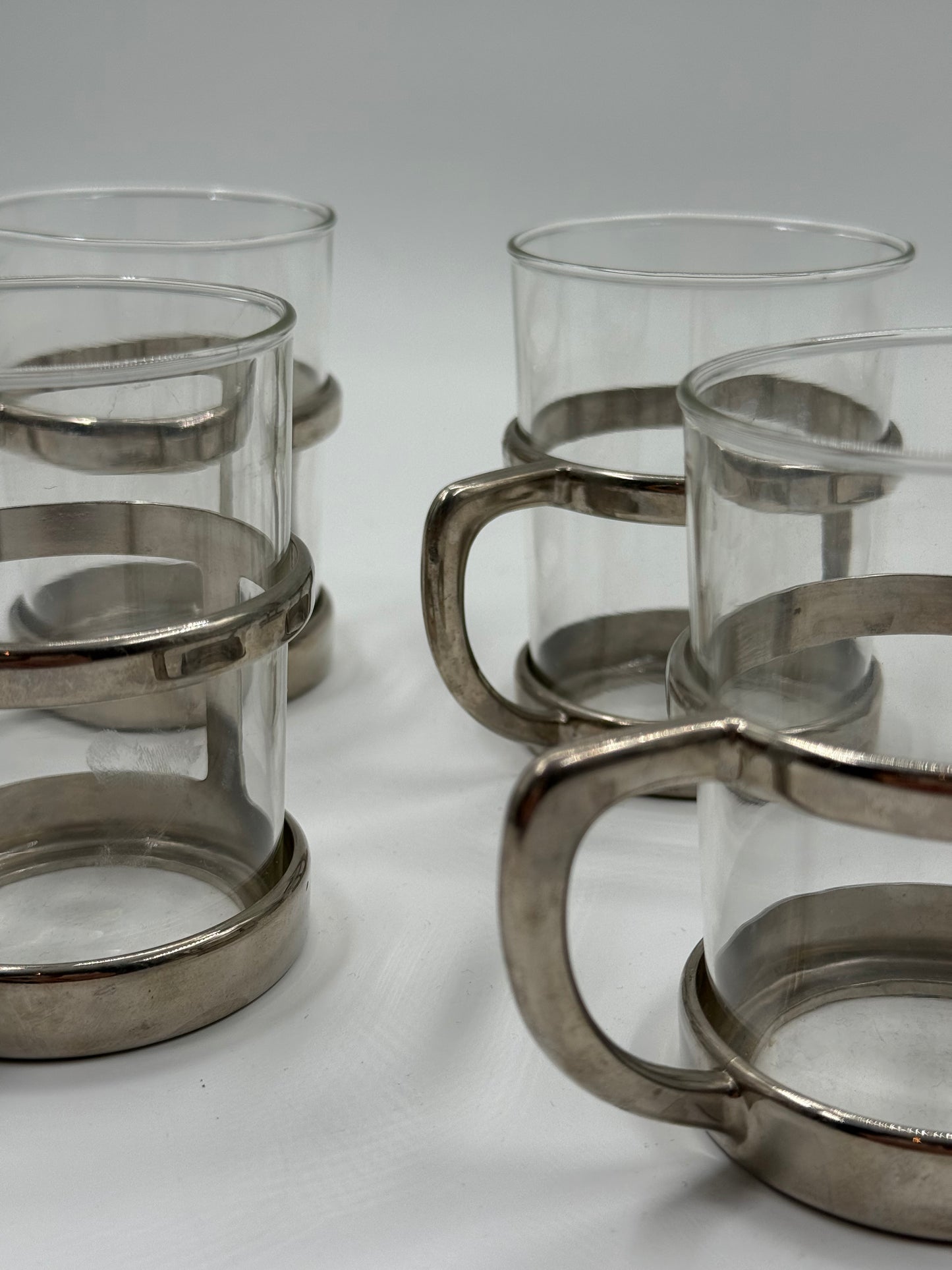 Modernist Tea Glasses with Sculptural Steel Holders, Set of Five (1970s)