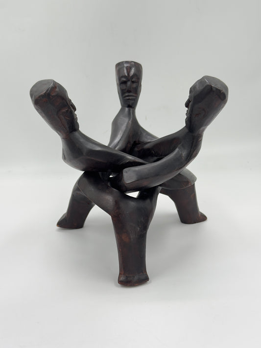 Hand-Carved Wood Sculpture of Three Interlocked Figures