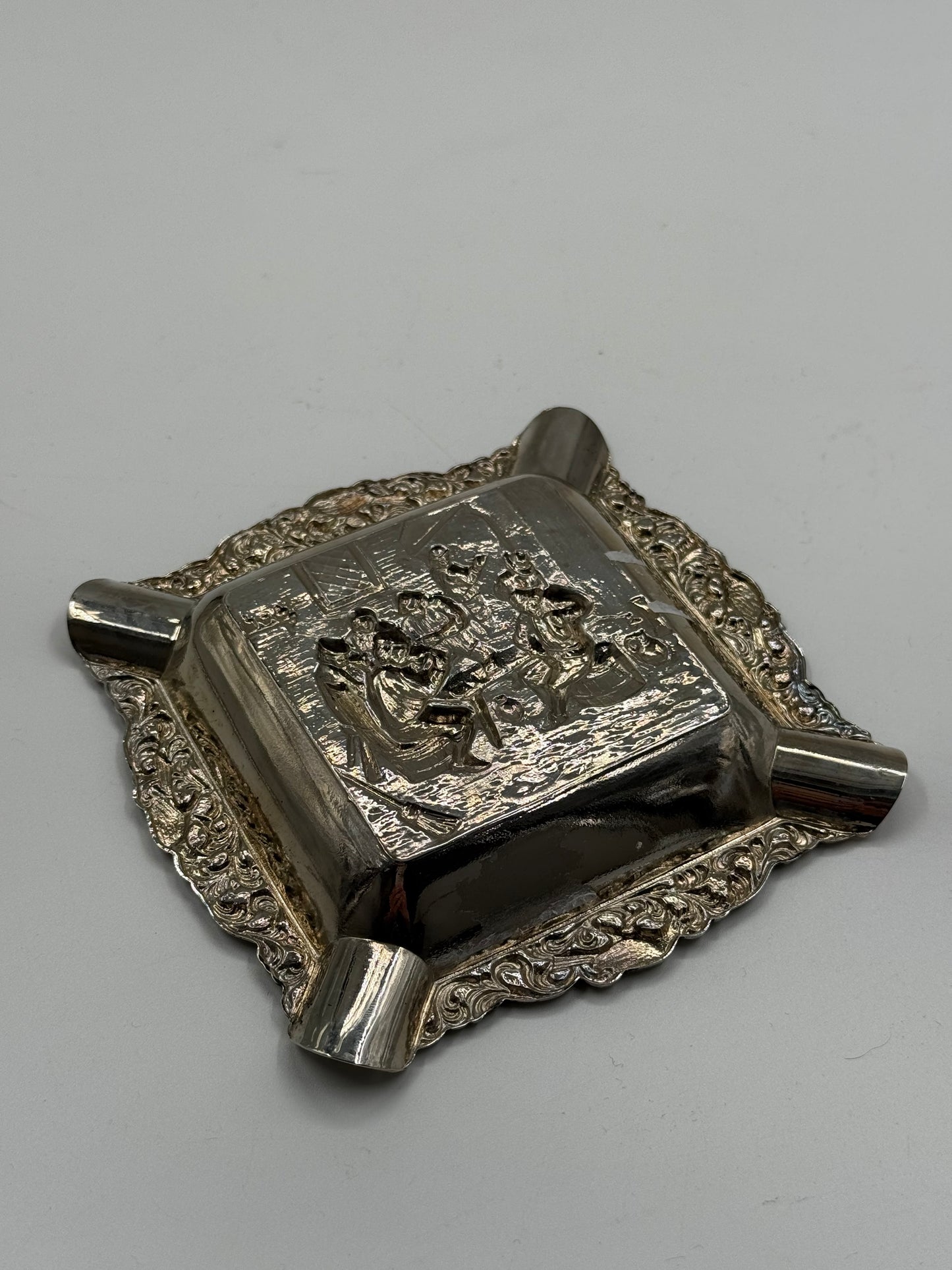 Vintage silver-plated ashtray with tavern scene relief