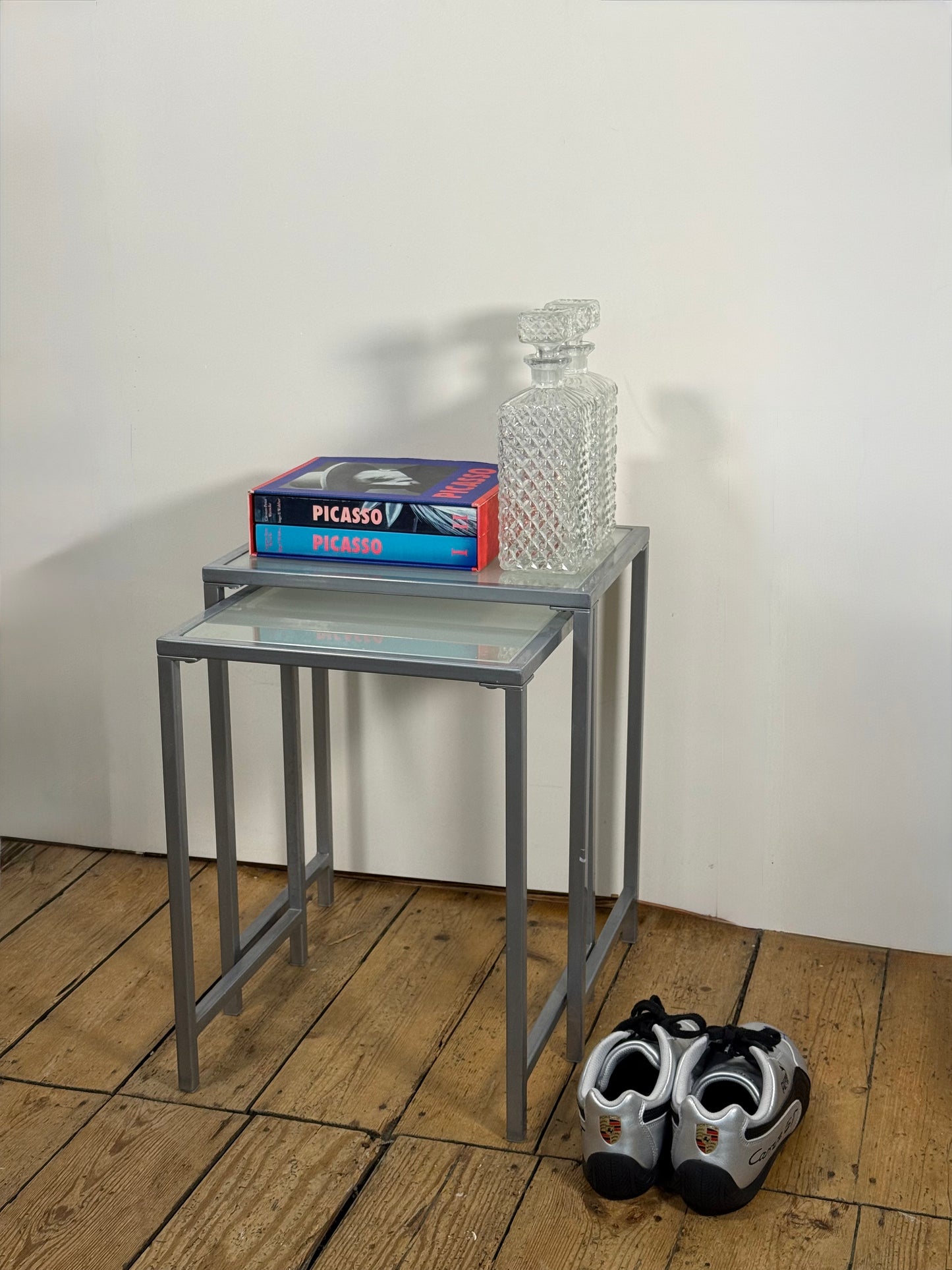 Set of Two Glass Nesting Tables (Industrial Steel Frame)