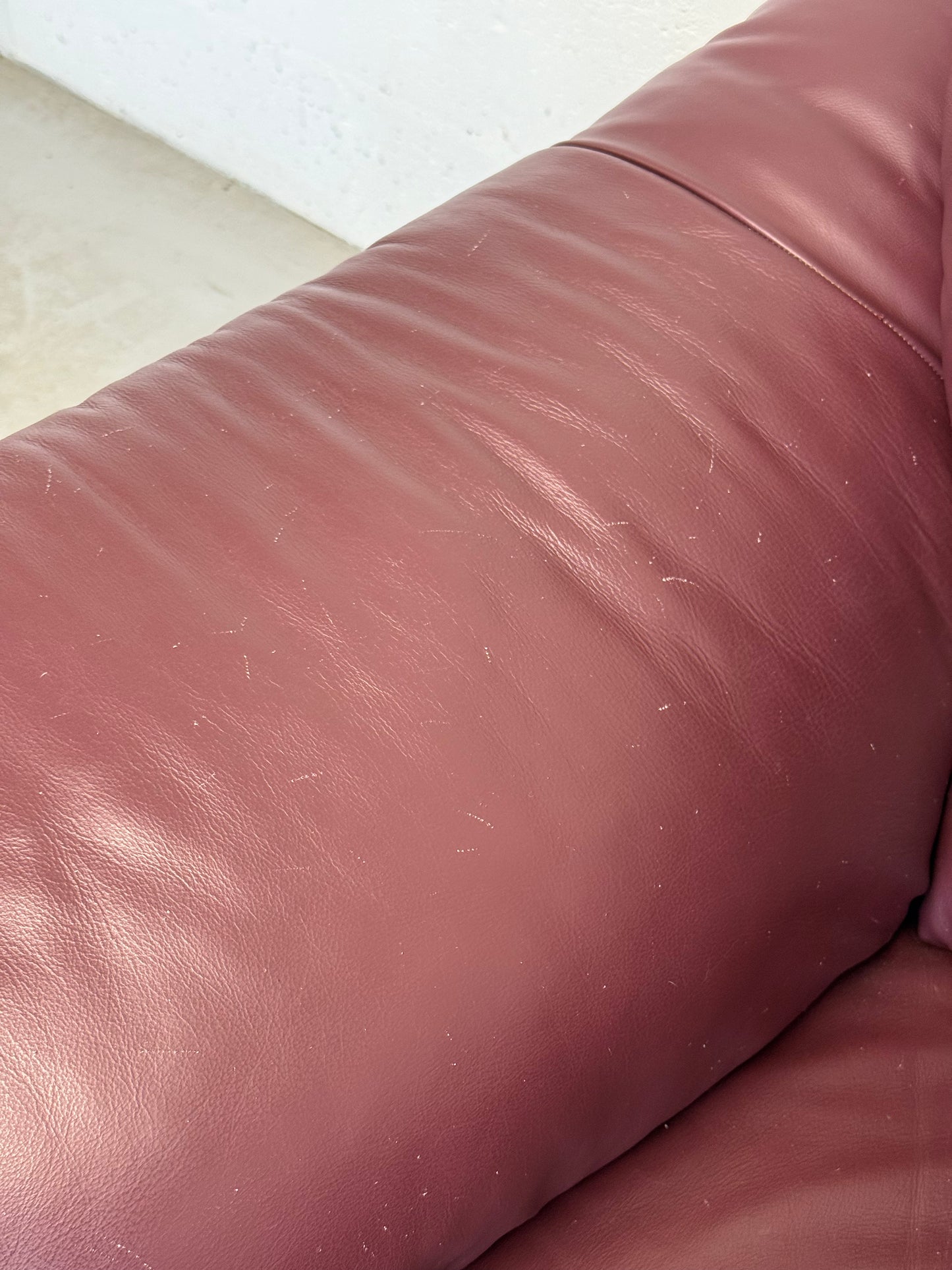 Natuzzi Burgundy Leather Armchair