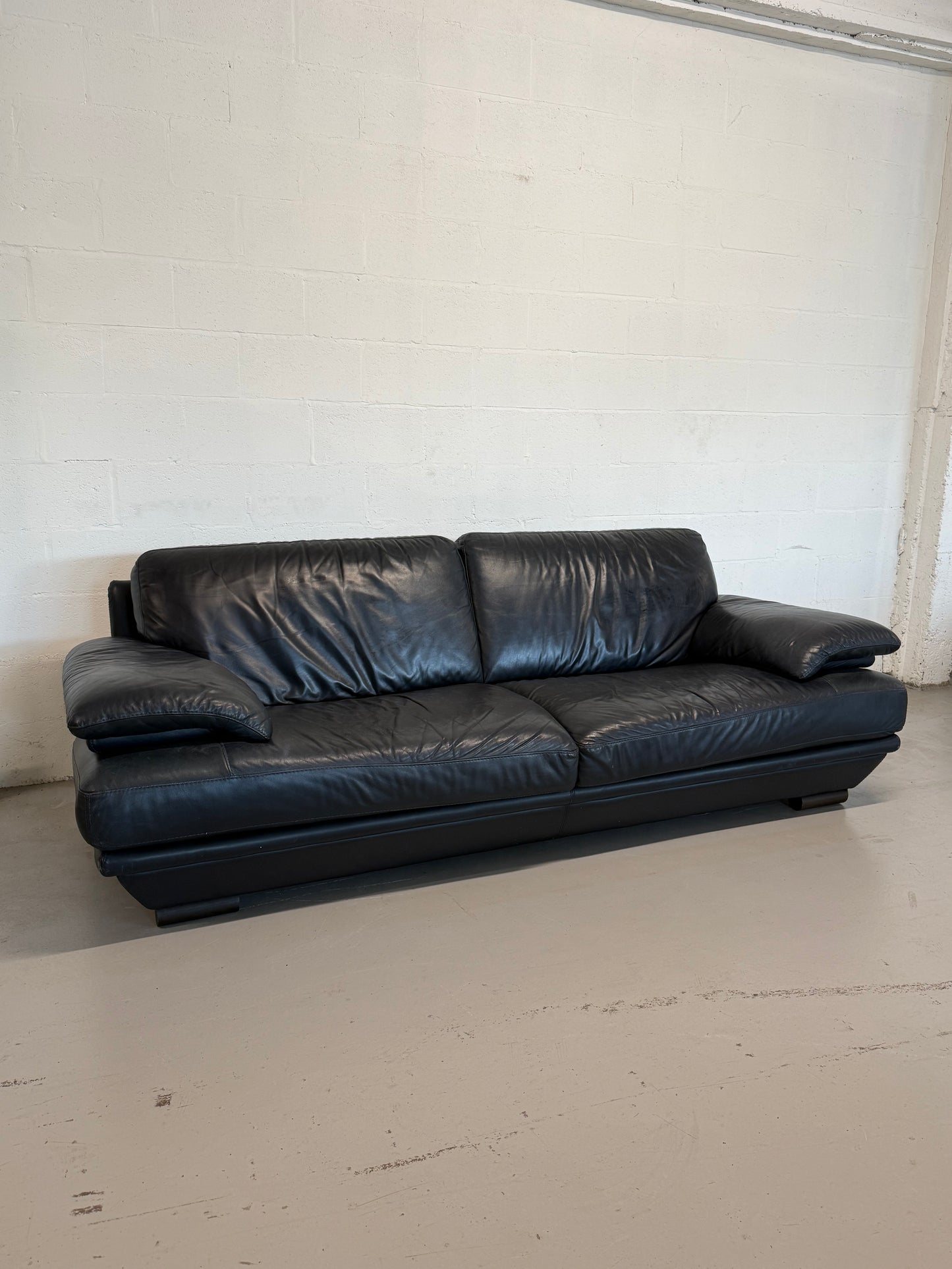 Natuzzi navy blue leather 3-seater sofa