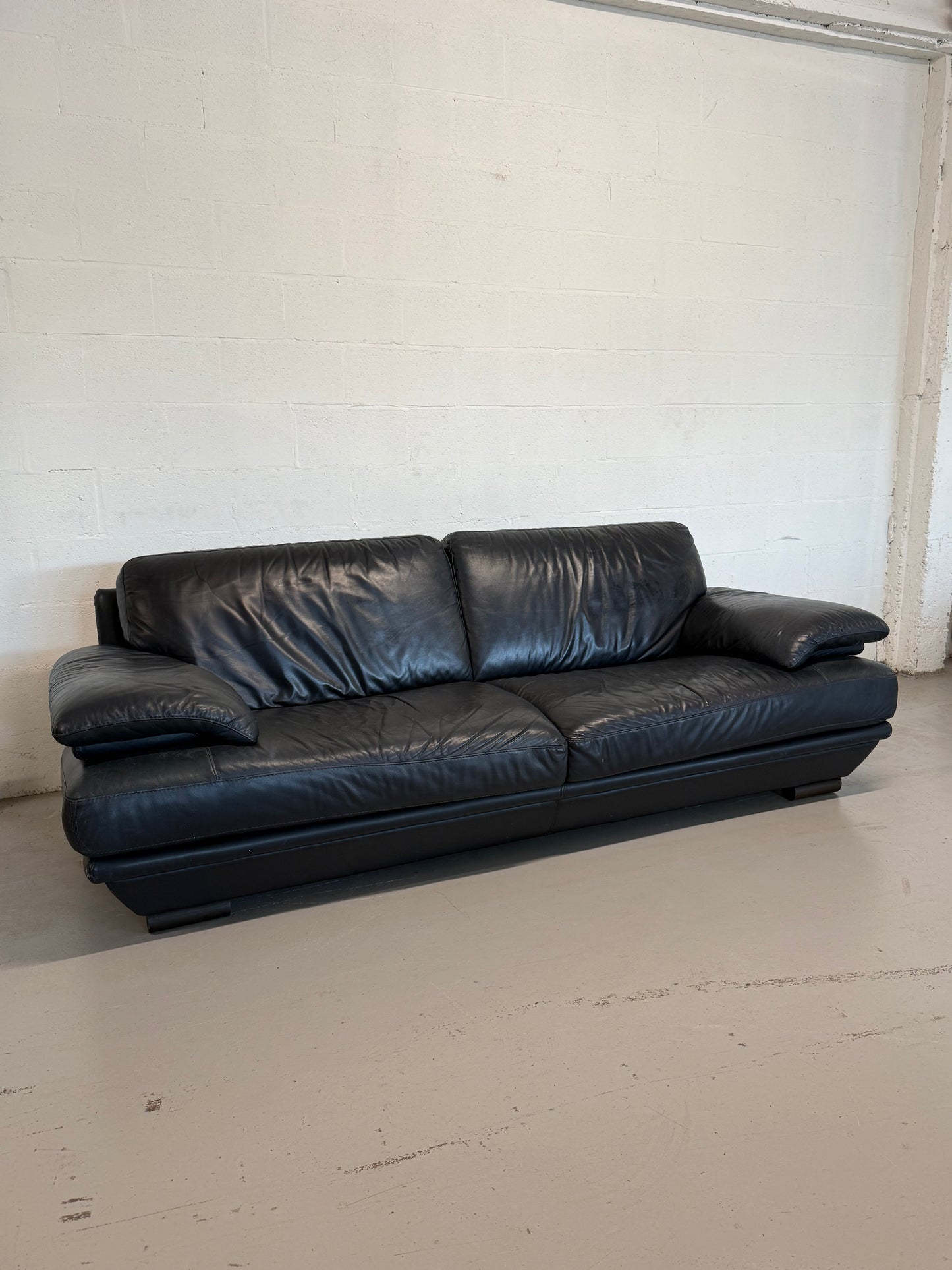 Natuzzi navy blue leather 3-seater sofa