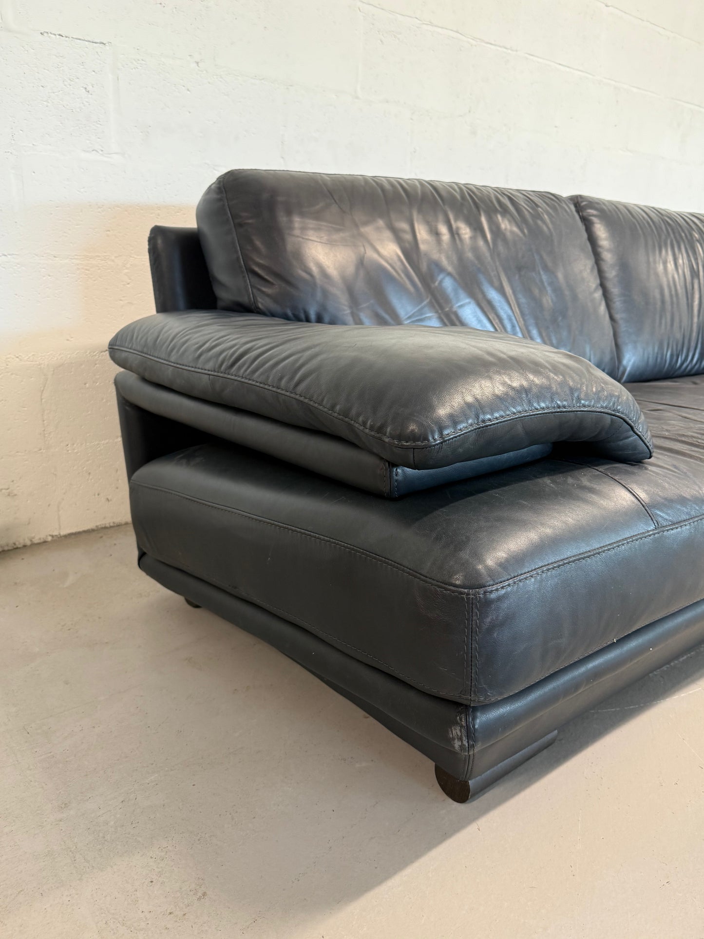 Natuzzi navy blue leather 3-seater sofa