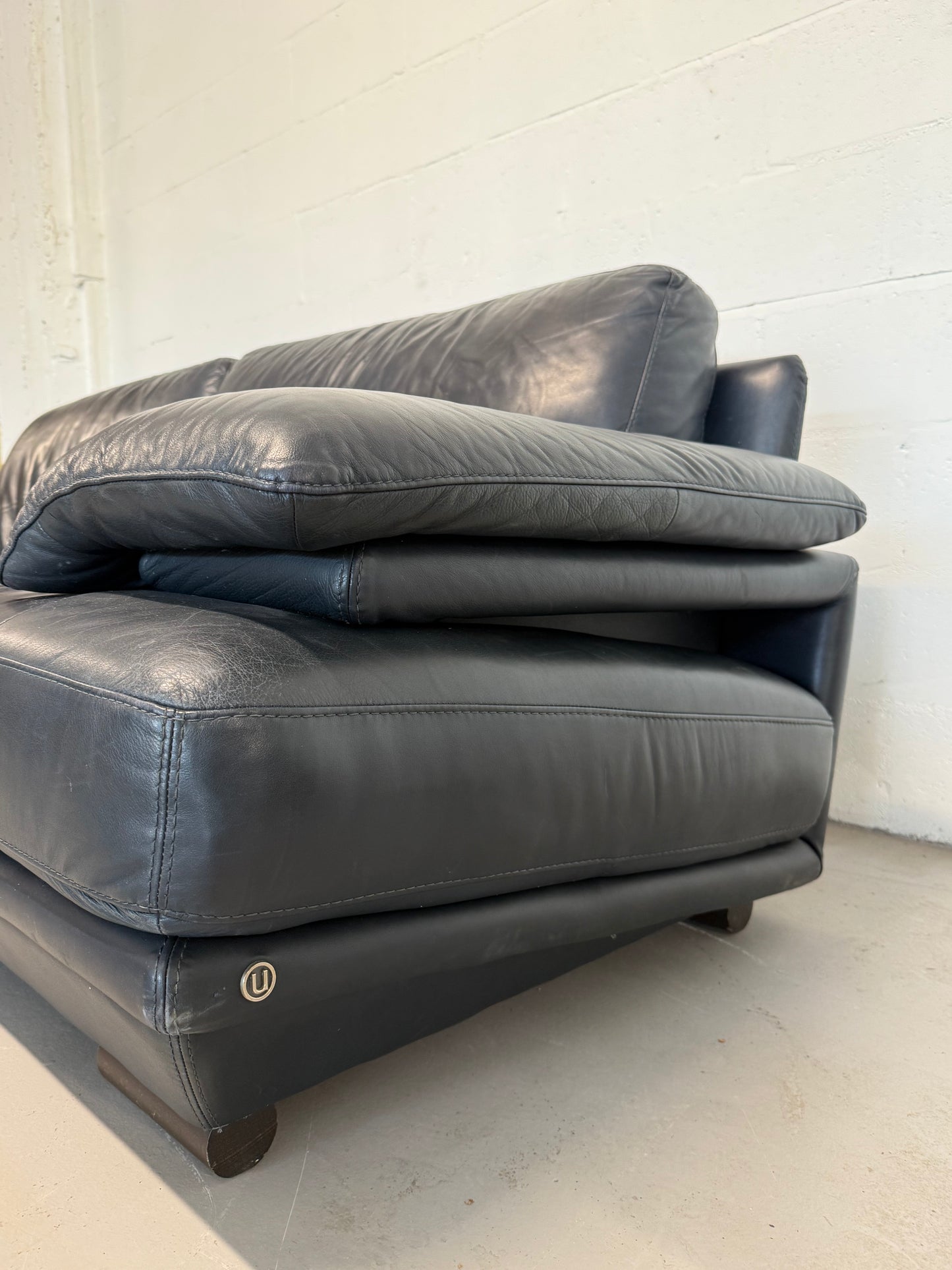 Natuzzi navy blue leather 3-seater sofa