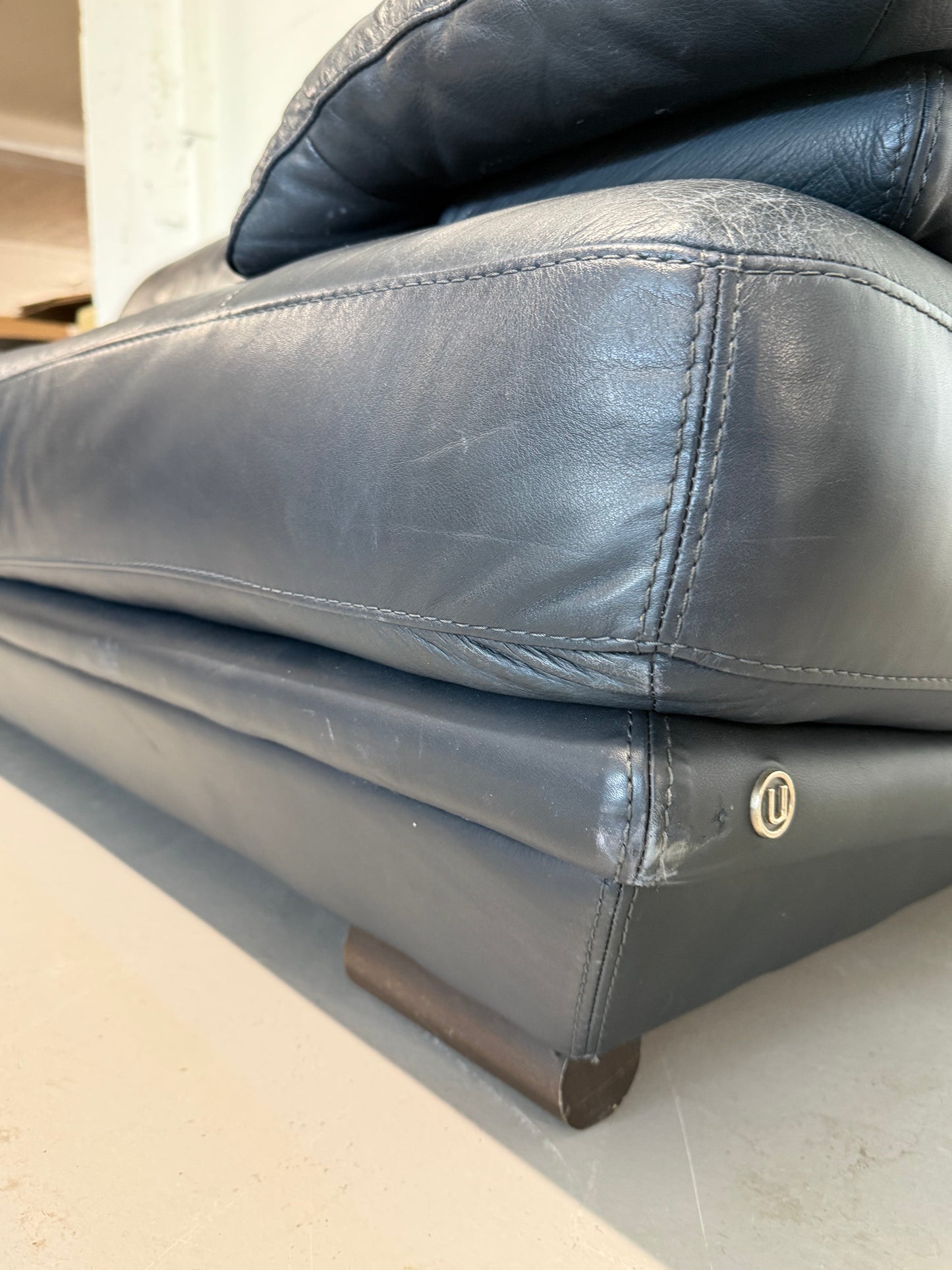 Natuzzi navy blue leather 3-seater sofa