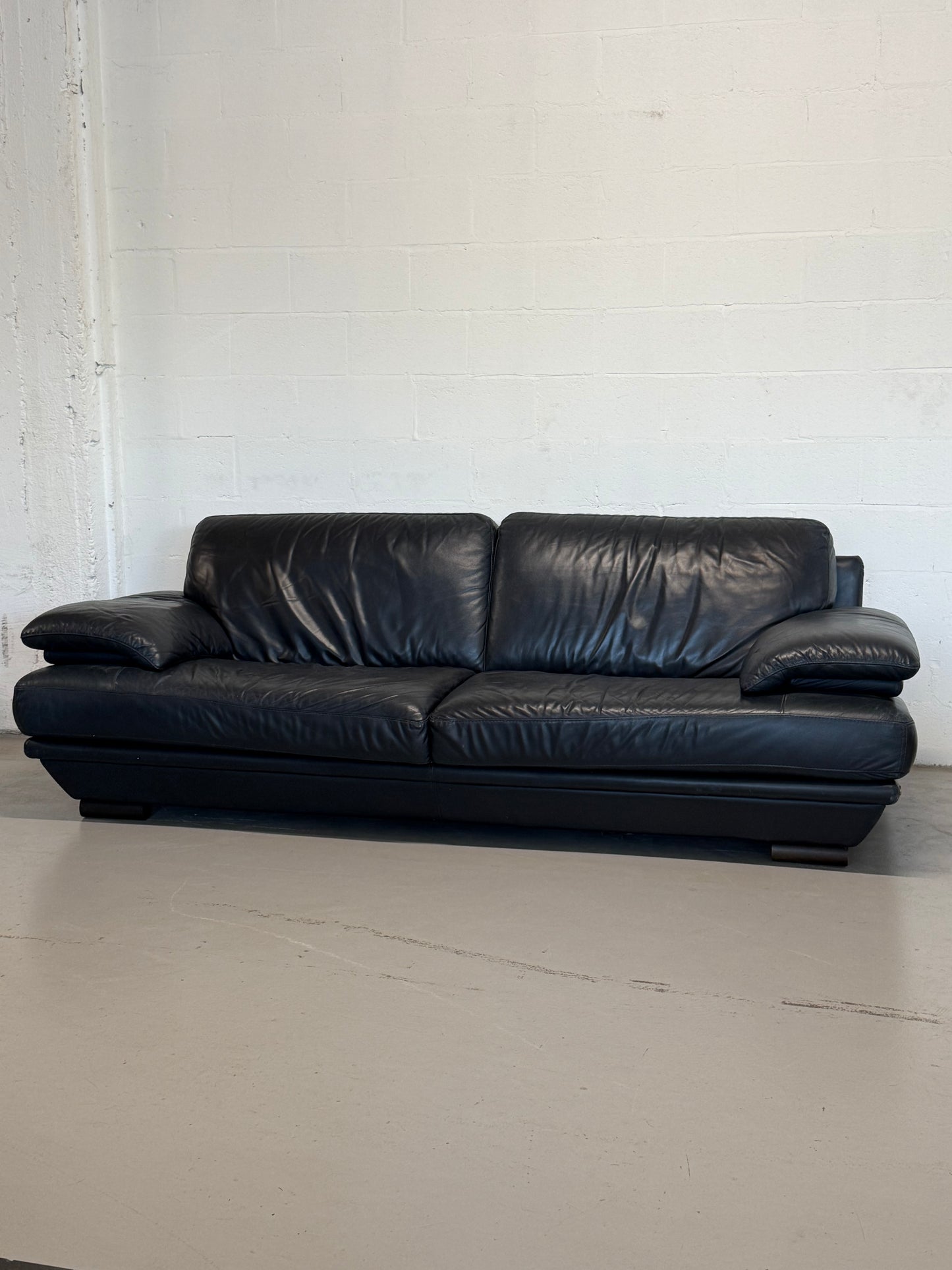 Natuzzi navy blue leather 3-seater sofa