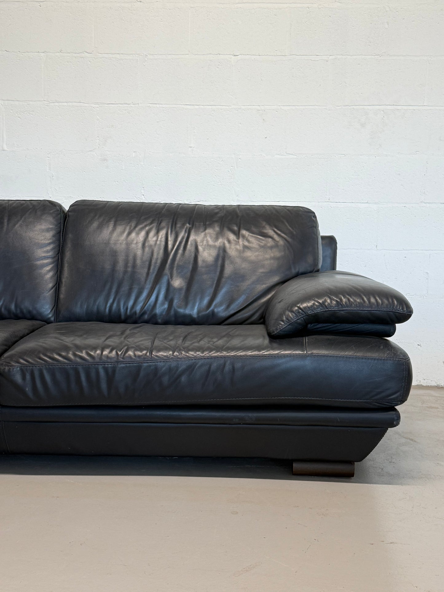 Natuzzi navy blue leather 3-seater sofa