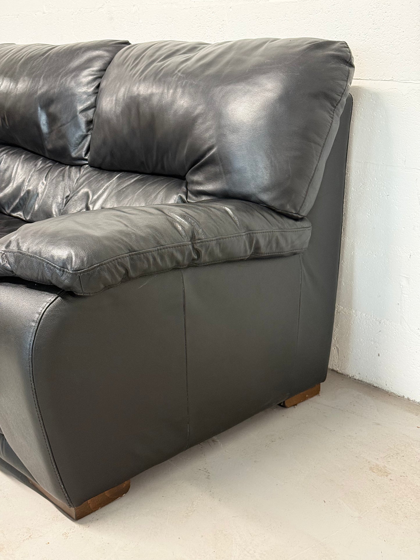 Black leather 2-seater sofa — Italian postmodern design