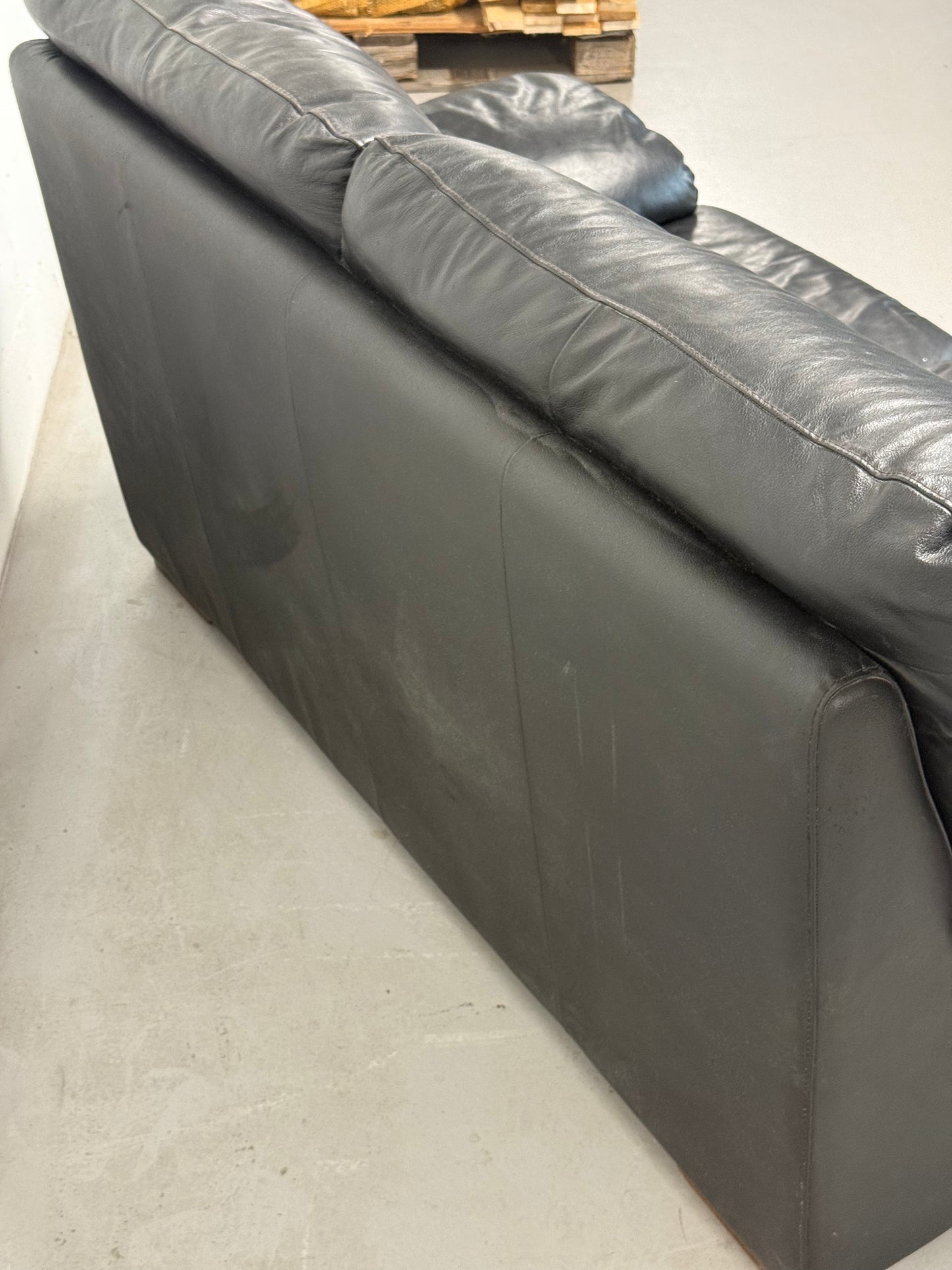 Black leather 2-seater sofa — Italian postmodern design