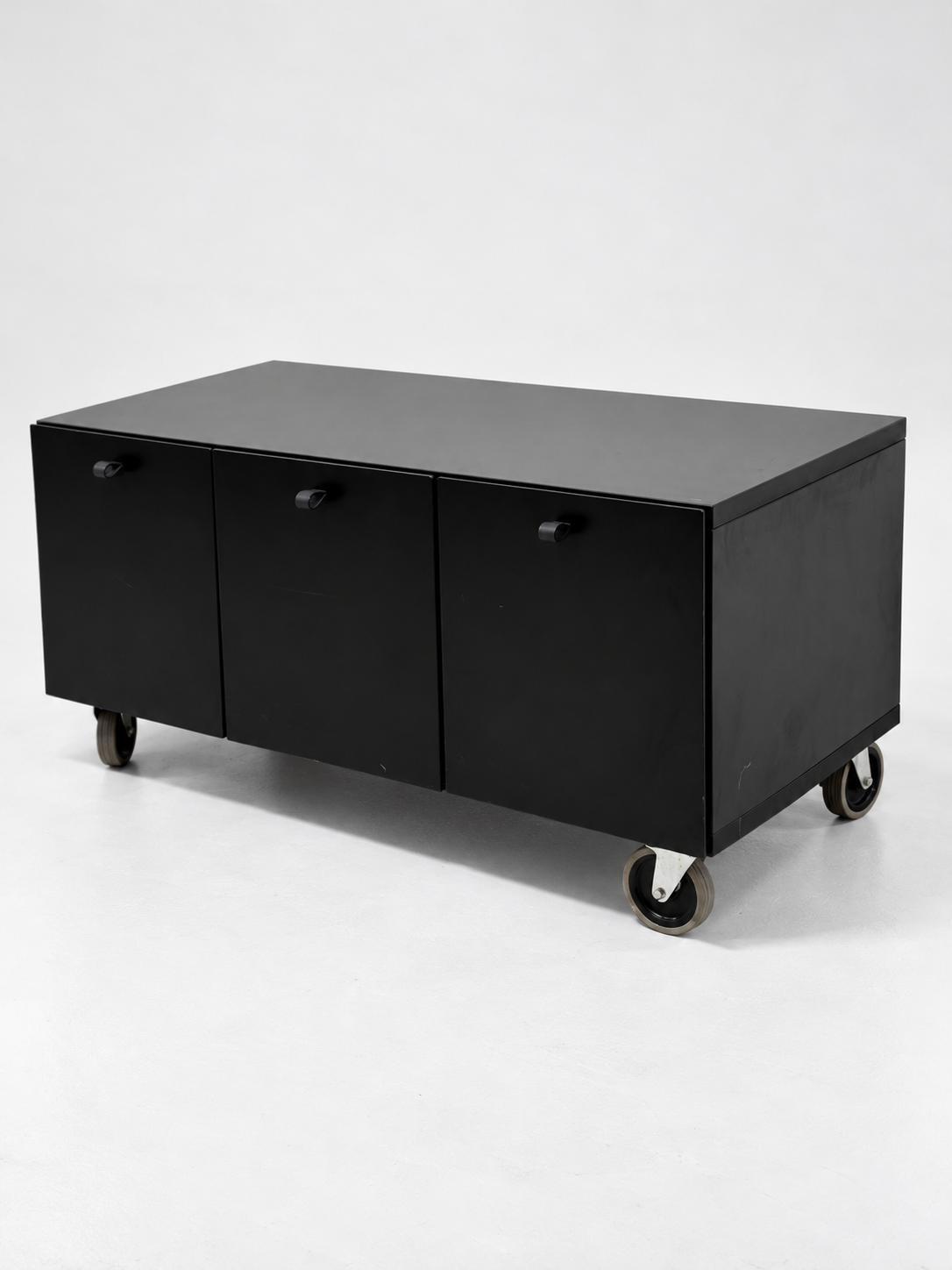 Bulo black rolling cabinet, three-quarter view