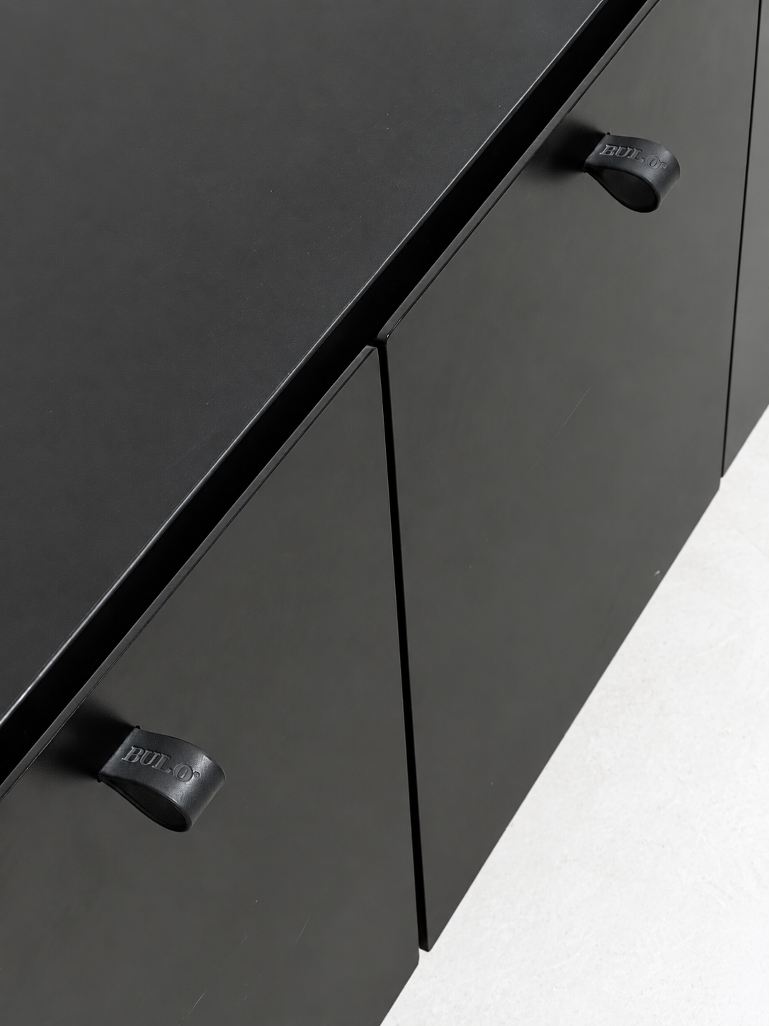 Bulo embossed leather loop handles